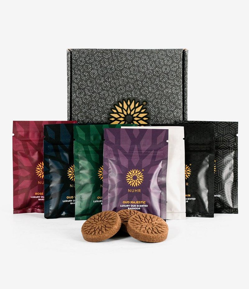 NUHR oud bakhoor bricks selection pack with seven scents and two bricks in front